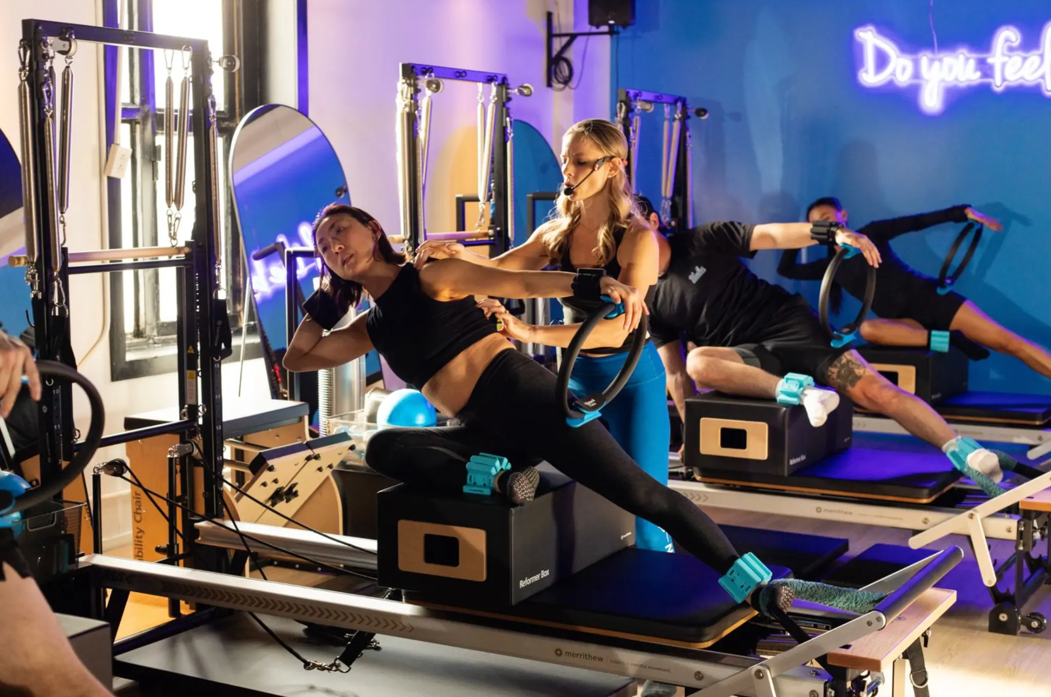 Pilates reformer class in session